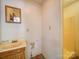 Functional bathroom featuring a single sink vanity and shower stall at 4901 Pine Oaks Dr, Monroe, NC 28112