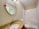 Bathroom featuring a granite vanity and tub with shower at 4901 Pine Oaks Dr, Monroe, NC 28112