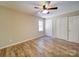 Bedroom featuring new floors, natural light, and closet at 4901 Pine Oaks Dr, Monroe, NC 28112