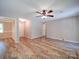 Spacious and bright living room featuring new floors and a neutral color palette at 4901 Pine Oaks Dr, Monroe, NC 28112