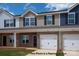 Charming brick townhomes with attached garages and manicured lawns at 5149 Tommy Ln # 1102, Stanley, NC 28164