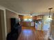 This kitchen has wood cabinets, and white appliances, plus vinyl flooring at 5501 Barrier Rd, Concord, NC 28025