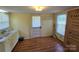 This laundry room includes a utility sink and a storm door at 5501 Barrier Rd, Concord, NC 28025