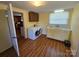 This laundry room includes a washer and dryer hookup with a utility sink at 5501 Barrier Rd, Concord, NC 28025