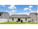 Spacious backyard with a well-maintained lawn and patio at 584 Lamorak Pl, Richburg, SC 29729