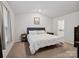Bright bedroom featuring a bed with white bedding and neutral decor at 584 Lamorak Pl, Richburg, SC 29729