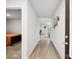 Bright hallway connecting to a bedroom and the living area with stylish decor at 584 Lamorak Pl, Richburg, SC 29729