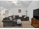 Comfortable living room with large sectional sofa and neutral color scheme at 584 Lamorak Pl, Richburg, SC 29729