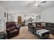 Bright living room open to kitchen featuring neutral tones and a view of dining area at 584 Lamorak Pl, Richburg, SC 29729