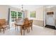 Bright dining room with natural lighting, a wooden table, and matching chairs at 5903 Wm Griffin Rd, Monroe, NC 28112