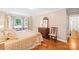 Spacious bedroom featuring hardwood floors, a large window, and a tranquil view at 5903 Wm Griffin Rd, Monroe, NC 28112
