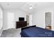 Spacious bedroom boasts vaulted ceilings, fan, and ensuite bathroom at 5943 Pisgah Way, Charlotte, NC 28217