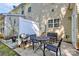 Cozy patio area with outdoor seating, ideal for relaxation and entertaining at 5943 Pisgah Way, Charlotte, NC 28217