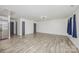 Spacious living area with modern flooring and neutral walls, ready for personalization at 611 Fernwood Dr, Albemarle, NC 28001