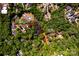 Aerial view of a property on a pond with the homesite's location highlighted at 6516 Sharon Hills Rd, Charlotte, NC 28210