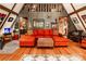 Spacious A-frame living area with hardwood floors, wood walls, and loft at 6516 Sharon Hills Rd, Charlotte, NC 28210