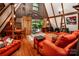 Cozy A-frame living area with wood walls, natural light and stylish furniture at 6516 Sharon Hills Rd, Charlotte, NC 28210