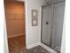 Bathroom featuring a walk-in shower, and a view of a closet with clothing rack at 704 Robert Moses Dr # 121, Gastonia, NC 28056