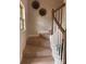 Carpeted staircase featuring white railings, and a nearby window for natural light at 704 Robert Moses Dr # 121, Gastonia, NC 28056