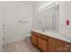 Bathroom featuring a single vanity and tile floor at 9047 Rosalyn Glen Rd, Cornelius, NC 28031