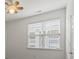 Bright bedroom with a large window with window blind at 9047 Rosalyn Glen Rd, Cornelius, NC 28031