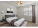 Bedroom with a large window and modern decor at 9047 Rosalyn Glen Rd, Cornelius, NC 28031