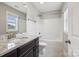 Bathroom features tiled floors, a granite vanity top and bright white shower at 907 Ospre Ln, Fort Mill, SC 29708
