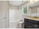 Bathroom features tiled floors, a granite vanity top and bright white shower at 907 Ospre Ln, Fort Mill, SC 29708