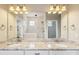 Luxurious bathroom featuring double sinks with granite countertop, and a separate shower and tub at 907 Ospre Ln, Fort Mill, SC 29708