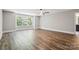 Large bedroom features hardwood floors, a ceiling fan and bright white trim at 907 Ospre Ln, Fort Mill, SC 29708