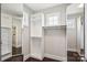 Walk-in closet with built-in shelving and mirrors, providing ample storage space at 907 Ospre Ln, Fort Mill, SC 29708