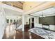 Elegant foyer with hardwood floors, staircase, and open floor plan at 9825 Ardrey Woods Dr, Charlotte, NC 28277