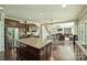 Open kitchen featuring granite island, stainless steel appliances, and seamless flow to the living room at 9825 Ardrey Woods Dr, Charlotte, NC 28277