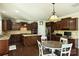 Well-equipped kitchen with stainless steel appliances and a cozy breakfast nook at 9825 Ardrey Woods Dr, Charlotte, NC 28277