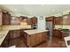 Modern kitchen with a large island, stainless steel appliances, and ample counter space at 9825 Ardrey Woods Dr, Charlotte, NC 28277