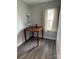 Cozy bedroom nook with natural light, a desk, and simple flooring at 106 E Gibbs St, Dallas, NC 28034