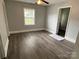 Bright bedroom with updated flooring and natural light at 106 E Gibbs St, Dallas, NC 28034