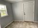 Mud Room features a door, a window, and neutral paint at 106 E Gibbs St, Dallas, NC 28034