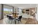 Open-concept living and dining area with modern decor and plenty of natural light at 1117 Hallman Branch Ln, Lincolnton, NC 28092
