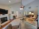 Spacious living room featuring a fireplace, vaulted ceilings and comfortable seating at 1132 Preakness Nw Ct # 24, Concord, NC 28027