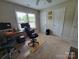 Office space with carpet, dual desks, large windows, and two closets for ample storage at 1132 Preakness Nw Ct # 24, Concord, NC 28027