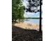 Sandy beach offers a relaxing space for sunbathing and enjoying waterfront recreation at 123 Archbell Point Ln, Mooresville, NC 28117