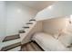 Cozy bedroom features a built-in bunk bed with wood stairs and a shiplap accent wall at 123 Archbell Point Ln, Mooresville, NC 28117