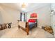 Cozy bedroom features an accent wall, plush carpet and warm, inviting lighting at 123 Archbell Point Ln, Mooresville, NC 28117