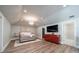 Spacious main bedroom features wood floors, walk-in closet, decorative panels, and ensuite bathroom at 123 Archbell Point Ln, Mooresville, NC 28117