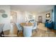 Cozy dining area with seating for four, and an open view of the adjacent living space at 129 Way Cross Ln, Troutman, NC 28166