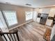 Upstairs open kitchen and dining area with stainless steel appliances and lots of natural light at 1295 Amber Ridge Nw Rd, Concord, NC 28027