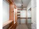 Customizable walk-in closet features adjustable shelving, drawers, and ample storage space at 1295 Amber Ridge Nw Rd, Concord, NC 28027