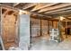 Basement showcasing block walls, wooden supports, and concrete floors at 130 Casper Rd, Gold Hill, NC 28071