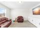 Cozy bonus room with ample seating, carpet flooring, and built-in storage at 133 W Neel Ranch Rd, Mooresville, NC 28115